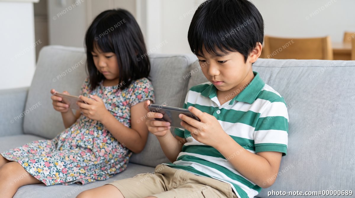 スマホに夢中になる子ども