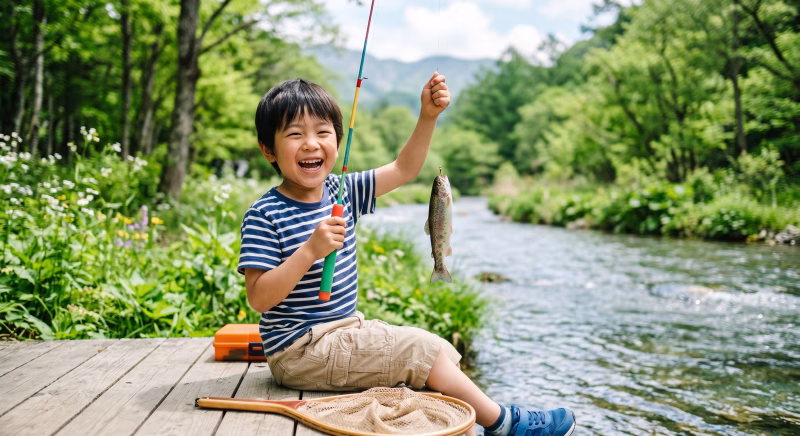 自然の中で魚釣りをして遊ぶ子供 キャンプ・アウトドア