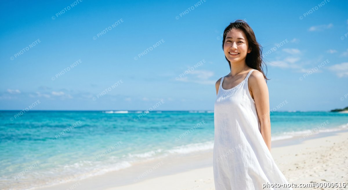 夏の海と砂浜をバックに、白いワンピースを着て佇む女性